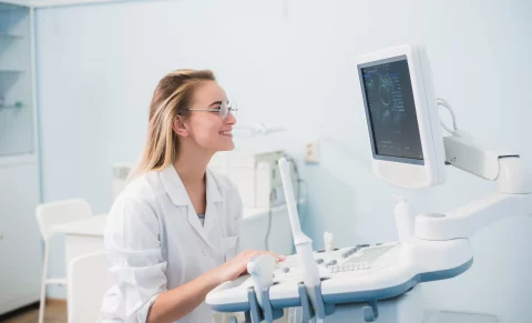 smiling-doctor-ultrasound-the-doctor-performed-a-2021-08-26-15-53-00-utc